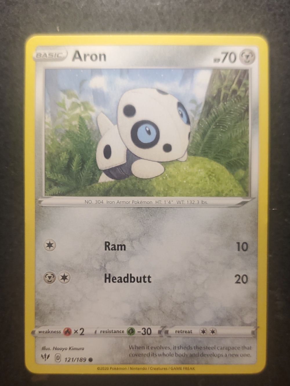 Pokemon Aron Card Yellow Border Blue Eyes White Body